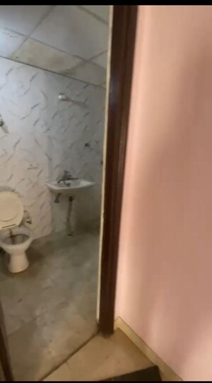 Bathroom in 2 BHK Apartment at Charms Castle, Raj Nagar Extension – for Rent