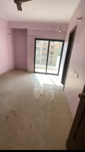 Room in 2 BHK Apartment at Charms Castle, Raj Nagar Extension – for Rent