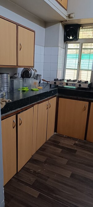 Kitchen in 2 BHK Apartment at Maharashtra CHS, Yerawada – for Rent