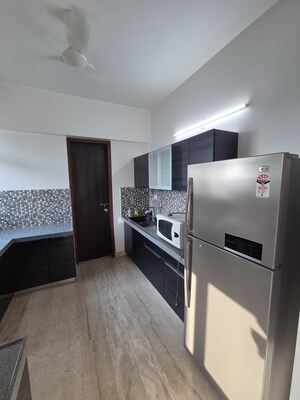 Kitchen in 2 BHK Apartment at Amanora Gold Towers, Hadapsar – for Rent