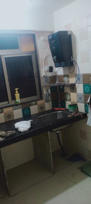 Kitchen in 1 BHK Apartment at Bindra Sateri Legacy, Andheri East – for Rent