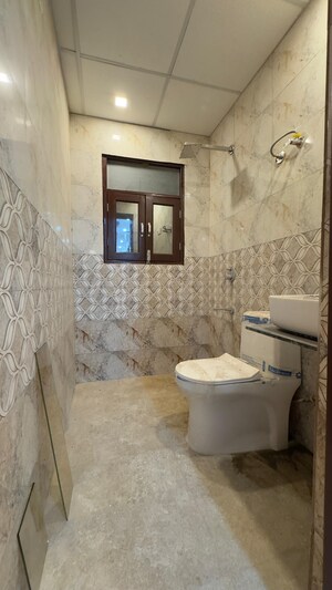 Bathroom in 3 BHK Builder Floor at Palm Residency Chhatarpur, Chattarpur – for Rent