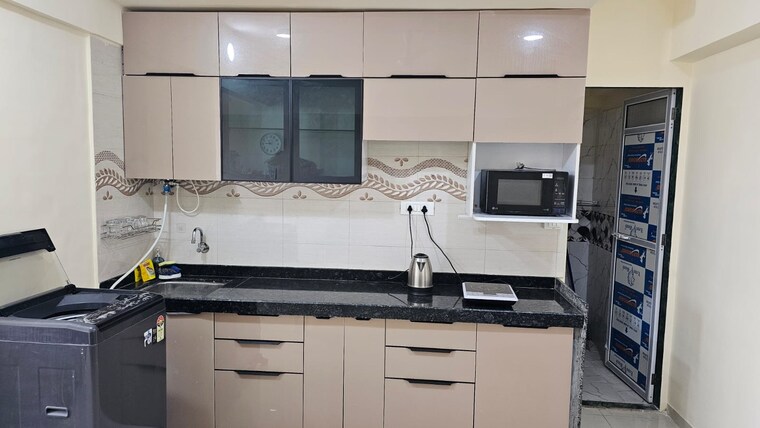 Kitchen, amritvan-complex 2 Bedroom 700 Sq.Ft. Apartment In Aarey Colony Mumbai 10198377