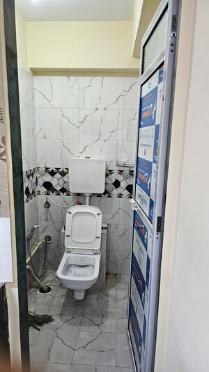 Bathroom in 2 BHK Apartment at Amritvan Complex, Aarey Colony – for Sale