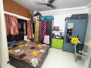 Bedroom in 2 BHK Apartment at Amritvan Complex, Aarey Colony – for Sale