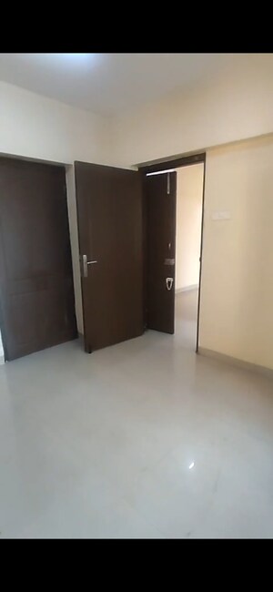 Bedroom in 2 BHK Apartment at K Raheja Palm Spring, Malad West – for Rent