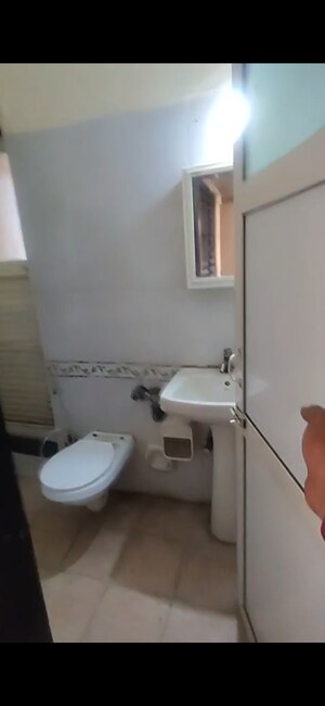 Bathroom in 2 BHK Apartment at K Raheja Palm Spring, Malad West – for Rent