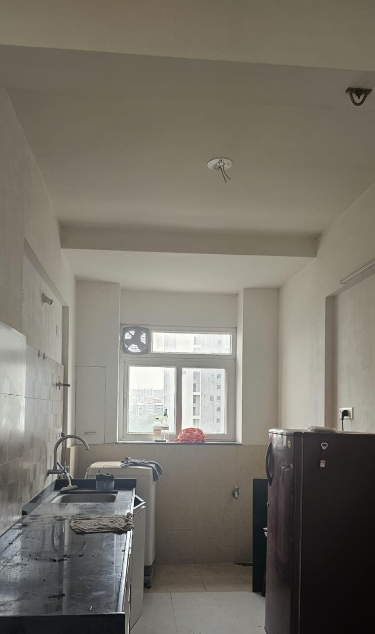 Kitchen, pinnacle-neelanchal 2 Bedroom 1000 Sq.Ft. Apartment In Baner Pune 10222140