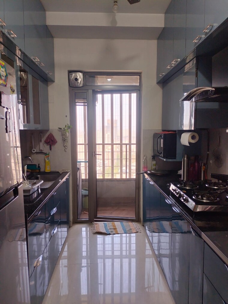 Kitchen, kalpataru-paramount 2 Bedroom 711 Sq.Ft. Apartment In Kapur Bawdi Thane 10222150