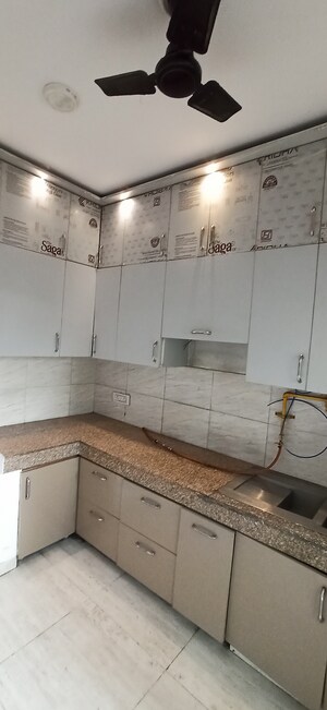 Kitchen in 2 BHK Apartment at Ajnara Ambrosia, Sector 118 – for Rent