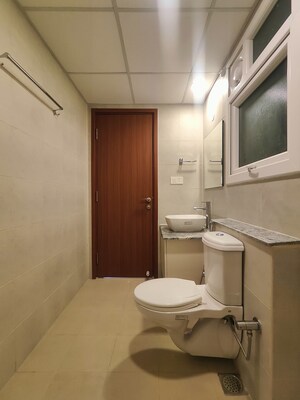 Bathroom in  Apartment at Bhartiya Nikoo Homes Phase 2, Thanisandra Main Road – for Rent