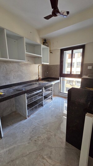 Kitchen in 2 BHK Apartment at DGS Sheetal Dharmaraj, Malad West – for Sale