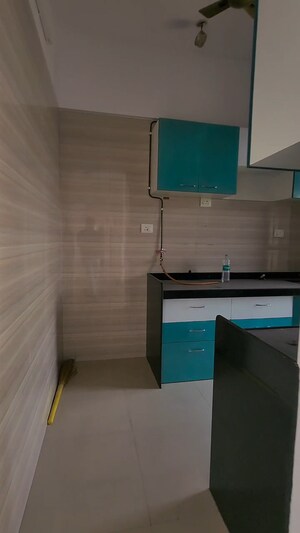 Kitchen in 3 BHK Apartment at Sheth Vasant Lawns, Laxmi Nagar – for Rent