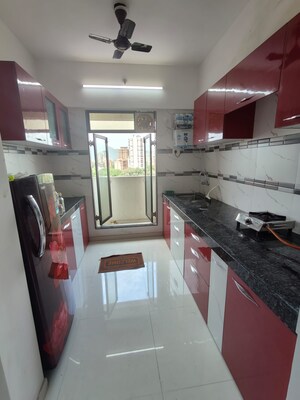 Kitchen in 1 BHK Apartment at Dynamic Crest, Shilphata – for Rent