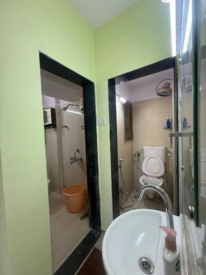 Bathroom in 1 BHK Apartment at Puranik City, Kasarvadavali – for Rent