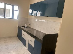 Kitchen in 1 BHK Apartment at Eden Park, Viman Nagar – for Rent