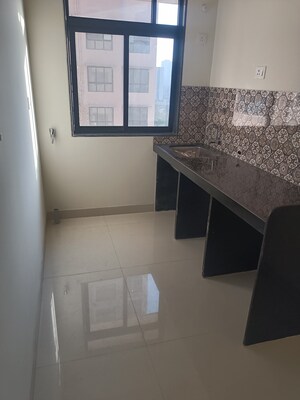 Kitchen in 2 BHK Apartment at Girnar Tower Parel, Parel – for Sale