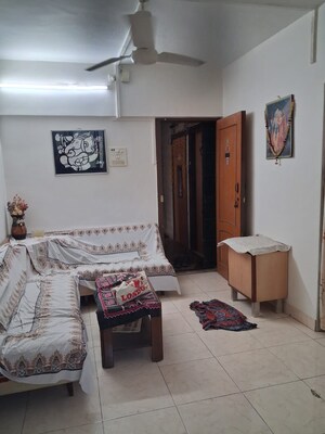 Living Room in 2 BHK Apartment at Dahisar West – for Sale