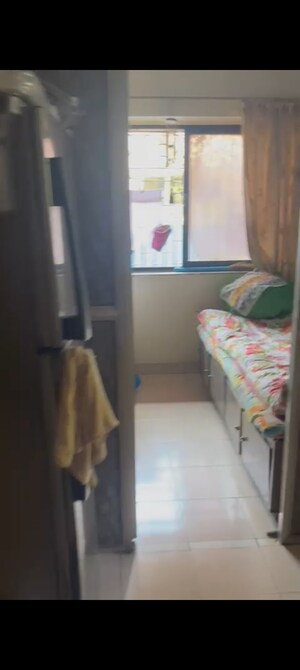 Bedroom in 1 BHK Apartment at Mantra Building, Khar West – for Sale