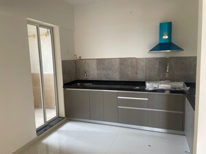 Kitchen in 2 BHK Apartment at Pride Purple Park Titan, Hinjewadi – for Rent