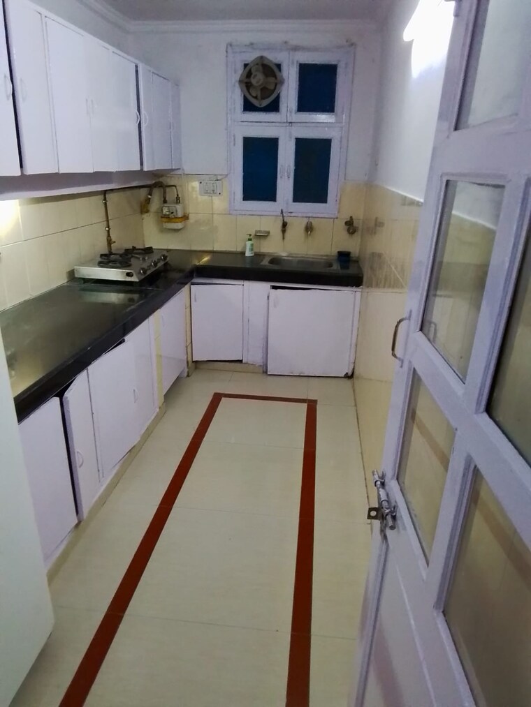 Kitchen, friends colony 4 Bedroom 1000 Sq.Yd. Independent House In Friends Colony Delhi 10285199