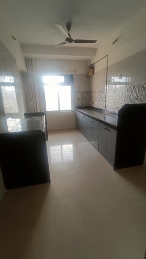Kitchen in 3 BHK Apartment at SSD Goregaon Pearl CHSL, Goregaon West – for Rent