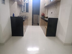 Kitchen in  Apartment at Paravsakshi Apartments, Pimple Saudagar – for Rent