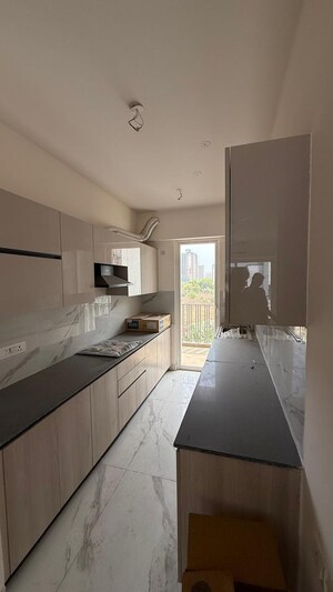 Kitchen in 2.5 BHK Apartment at Smart World Gems, Sector 89 – for Rent