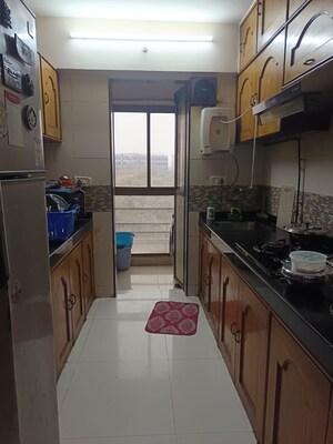 Kitchen in 2 BHK Apartment at Kanakia Rainforest, Andheri East – for Rent