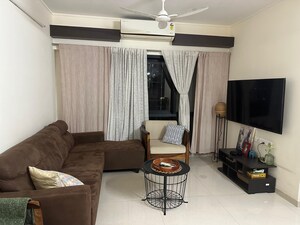 Living Room in 2 BHK Apartment at Kanakia Rainforest, Andheri East – for Rent