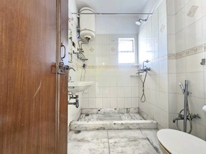 Bathroom in 3 BHK Builder Floor at Panchsheel Enclave – for Rent
