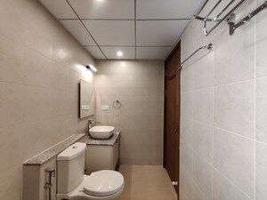 Bathroom in  Apartment at Bhartiya City Nikoo Homes 4, Thanisandra Main Road – for Rent