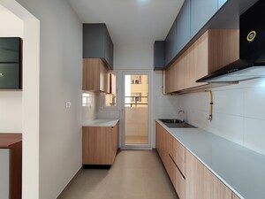 Kitchen in  Apartment at Bhartiya City Nikoo Homes 4, Thanisandra Main Road – for Rent