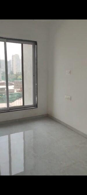 Room in 2.5 BHK Apartment at Ramvijay CHS, Charkop Sector 3 – for Sale