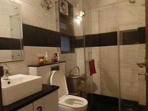 Bathroom in 4 BHK Builder Floor at Unitech South City II, Sector 50 – for Sale