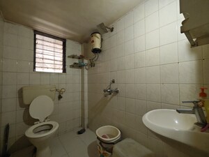 Bathroom in 2 BHK Apartment at Vijay Nagari Annex, Waghbil – for Sale