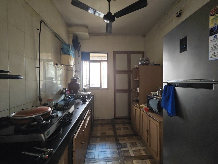Kitchen, vijay-nagari-annex 2 Bedroom 620 Sq.Ft. Apartment In Waghbil Thane 10334516