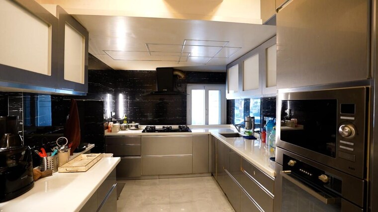 Kitchen, hiranandani-gardens-eden-bungalows 5 Bedroom 3750 Sq.Ft. Apartment In Powai Mumbai 10334526