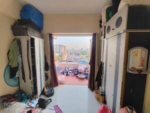 Living Room in 1 BHK Apartment at Sai Landmark, Thergaon – for Sale