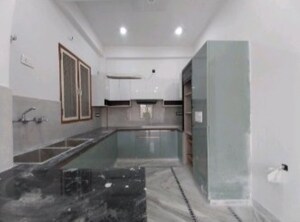 Kitchen in 2 BHK Apartment at Gaur Atulyam, Omicron I Greater Noida – for Rent