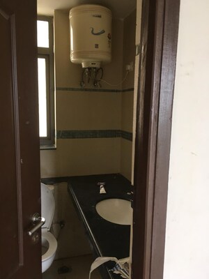 Bathroom in 2 BHK Apartment at Unitech Uniworld Gardens 2, Sector 47 – for Rent