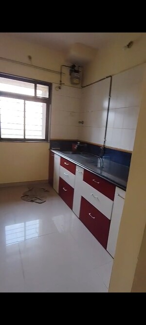 Kitchen in 2 BHK Apartment at Puranik City, Kasarvadavali – for Rent