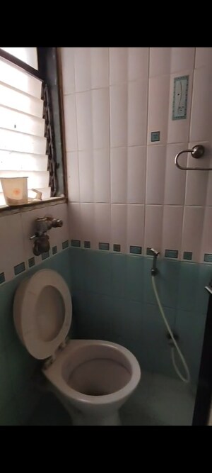 Bathroom in 2 BHK Apartment at Puranik City, Kasarvadavali – for Rent
