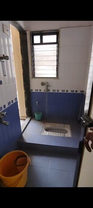 Bathroom in 2 BHK Apartment at Puranik City, Kasarvadavali – for Rent