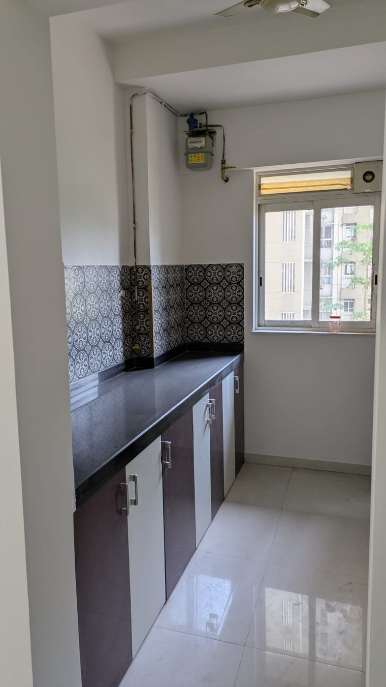 Kitchen, lodha-amara 2 Bedroom 735 Sq.Ft. Apartment In Kolshet Road Thane 10357387