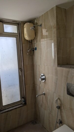 Bathroom in 2 BHK Apartment at Lodha Amara, Kolshet Road – for Rent