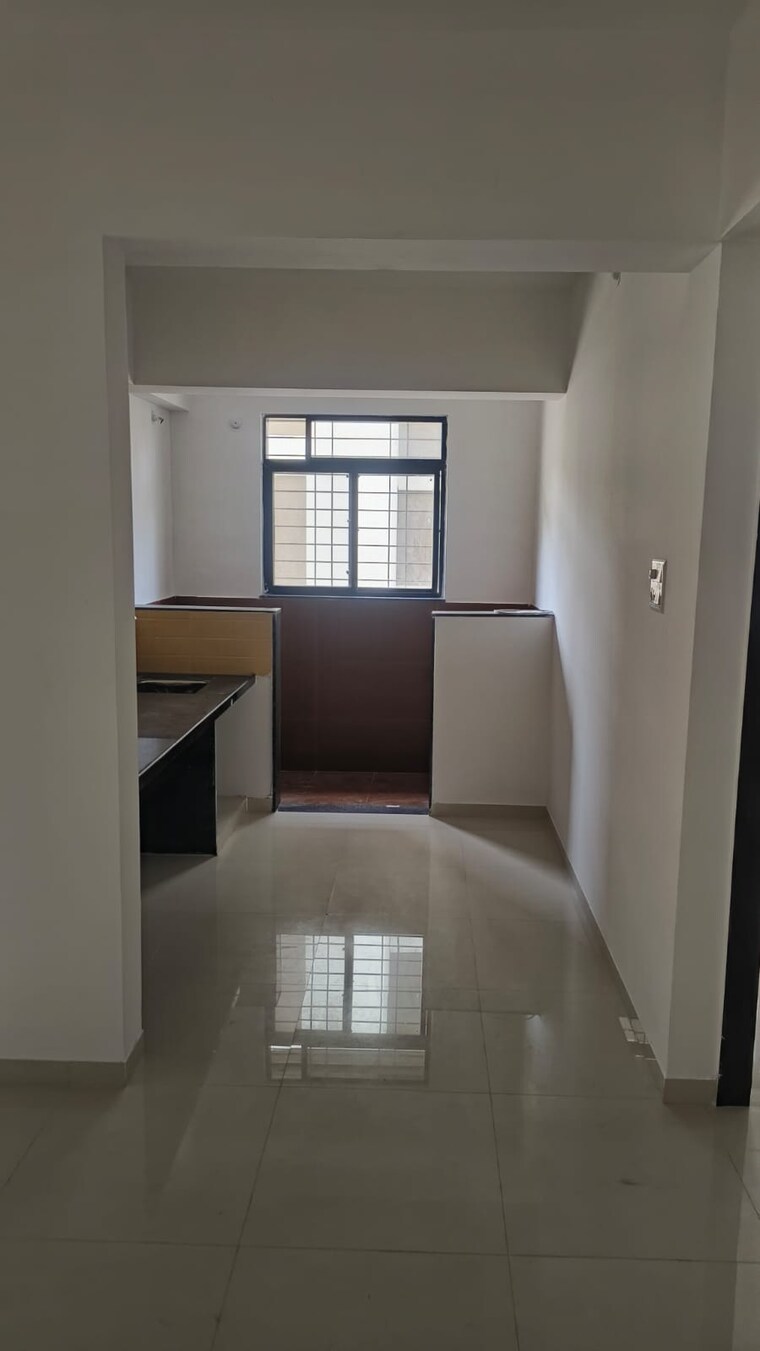 Kitchen, royal-ishana 2 Bedroom 750 Sq.Ft. Apartment In Thergaon Pune 10357475