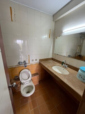 Bathroom in 3 BHK Apartment at Green Valley CHS, Wanwadi – for Rent