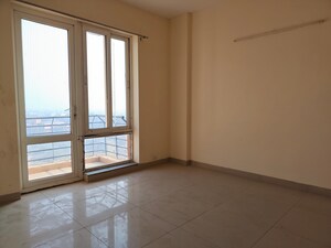 Room in 2.5 BHK Apartment at Mahindra Aura, Sector 110a – for Rent