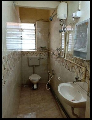 Bathroom in 1 BHK Apartment at Navin Nagar – for Rent